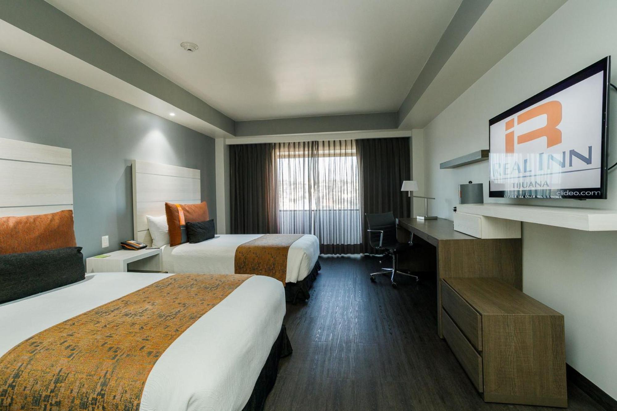 Real Inn Tijuana By Camino Real Hoteles Ngoại thất bức ảnh A typical room at the hotel